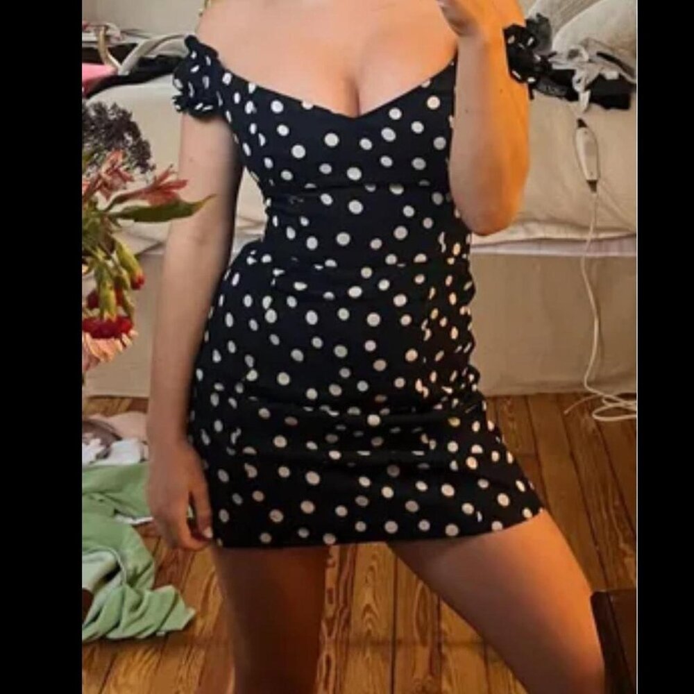 Super cute dress and makes curves look great!